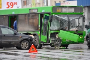 Bus accident scene with hazard cones blocking off the area