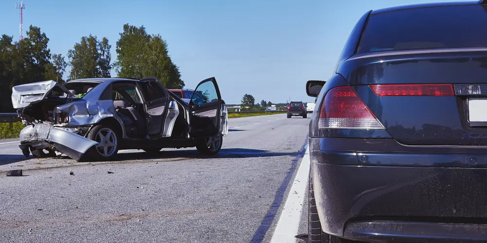 A car accident on the highway. Call or contact OlsenDaines if you need a car accident lawyer to represent you.